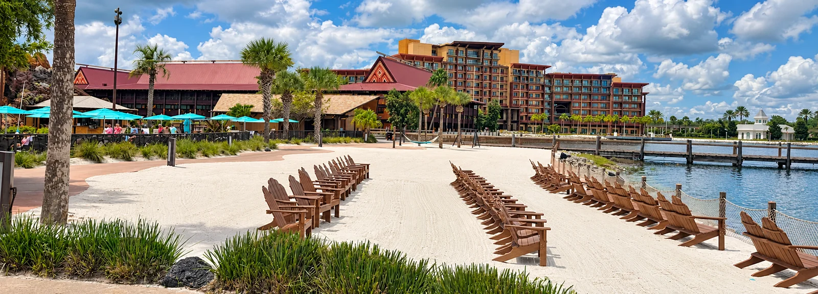 Disney’s Polynesian Village Resort beside its sandy beach and palm trees